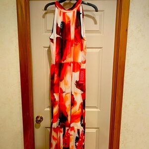 Maxi sleeveless multi colored dress. Ties around the neck in back